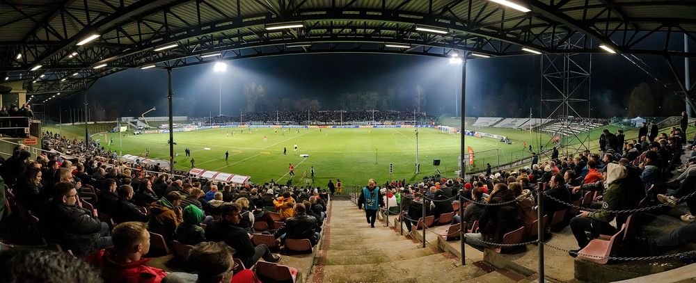 Association football match between Zagłębie Sosnowiec and Wisła Kraków at Stadion Ludowy in Sosnowiec , Silesian Voivodeship , Poland , on 28 October 2022. The panoramic…