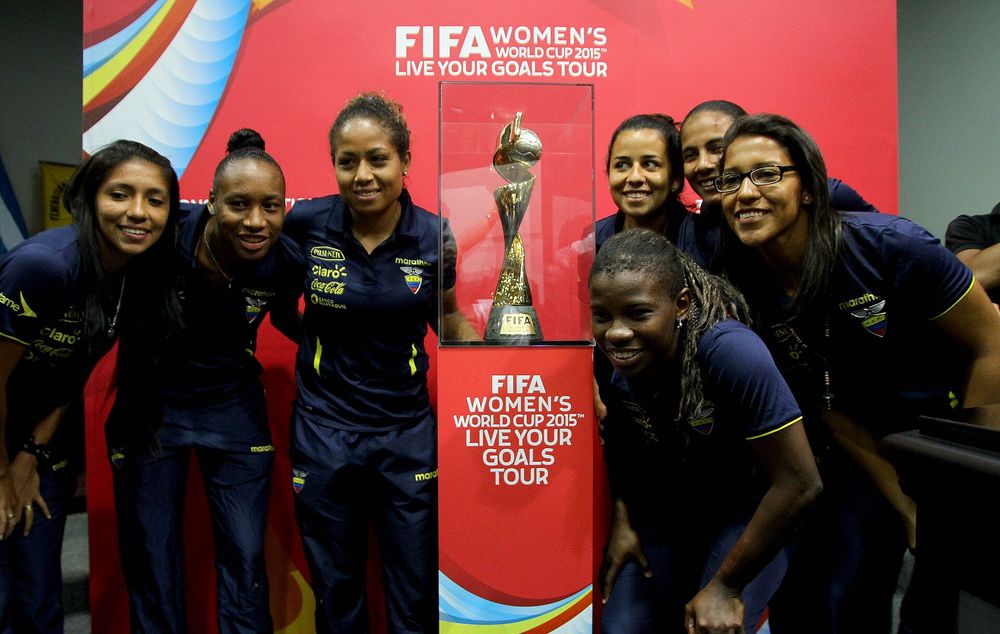 The FIFA Women's World Cup trophy on display with its spiral band and gold-clad football